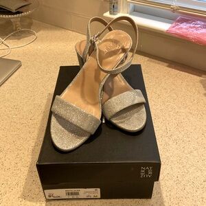 Silver woven chunky heel sandals! Worn once at a wedding. Soft arch support.